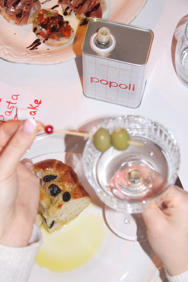 Pouring Popoli olive oil