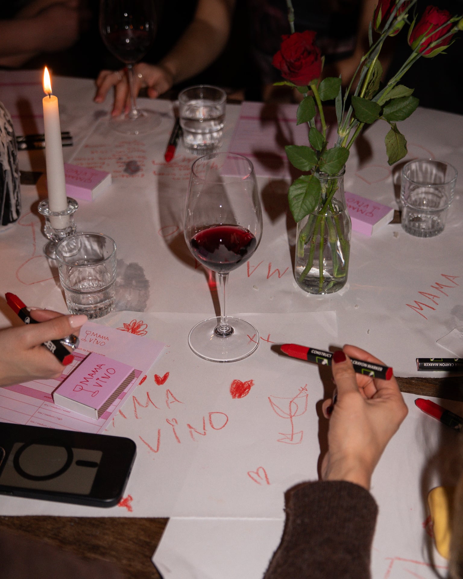interactive table at wine tasting event for tasting notes