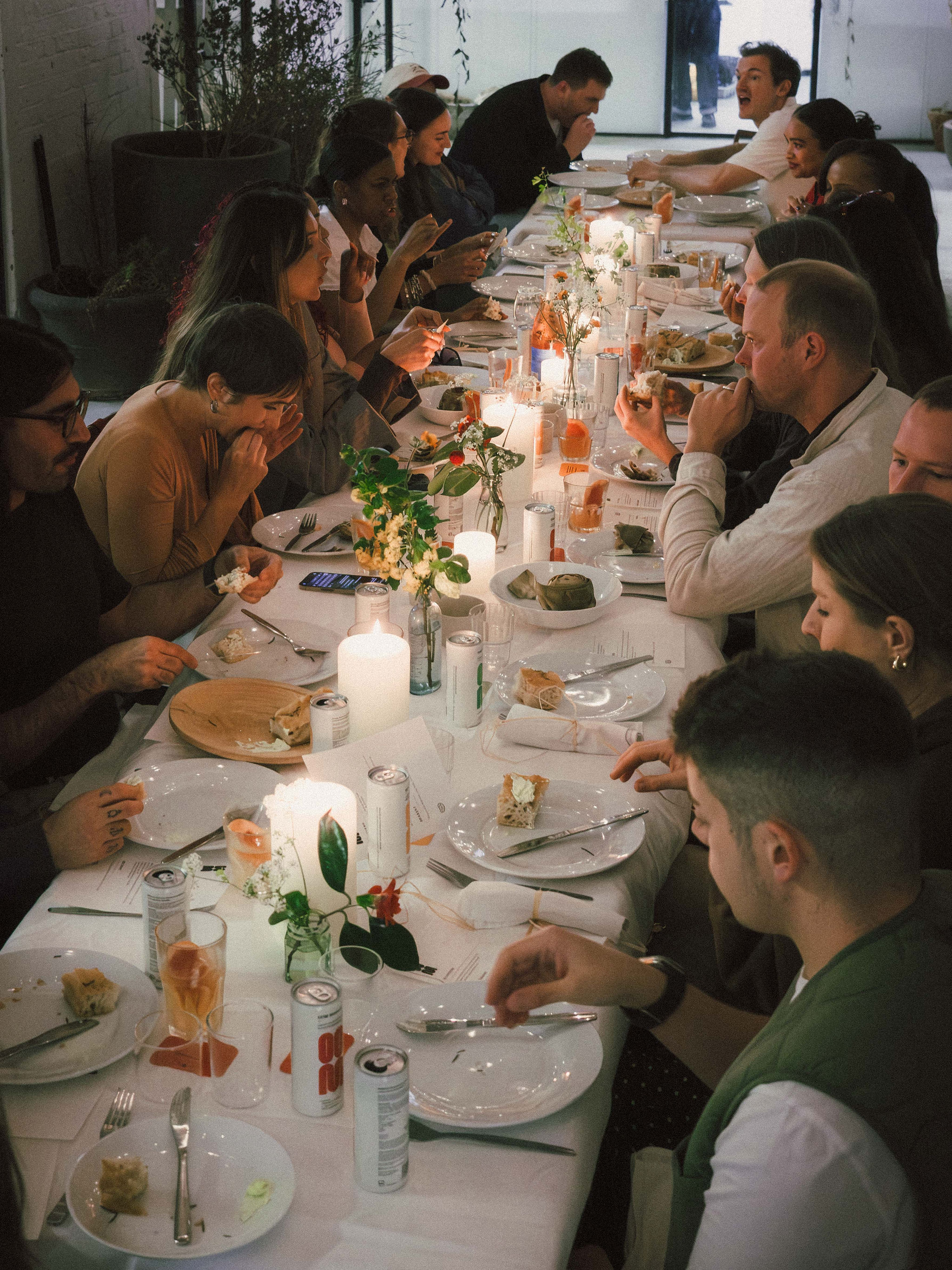 guest at table enjoying food together and talking