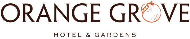 Orange Grove hotel logo on rotating track